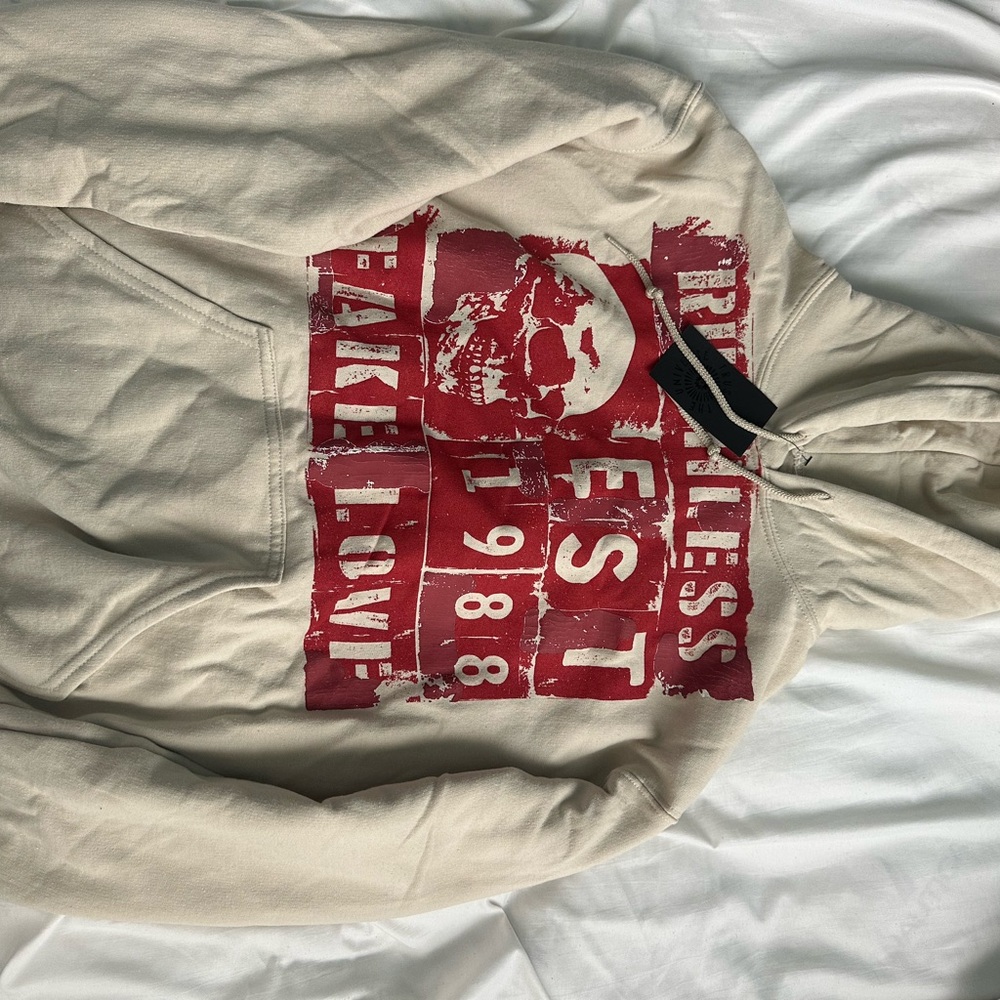 Beige Hoodie with Red Graphic Print